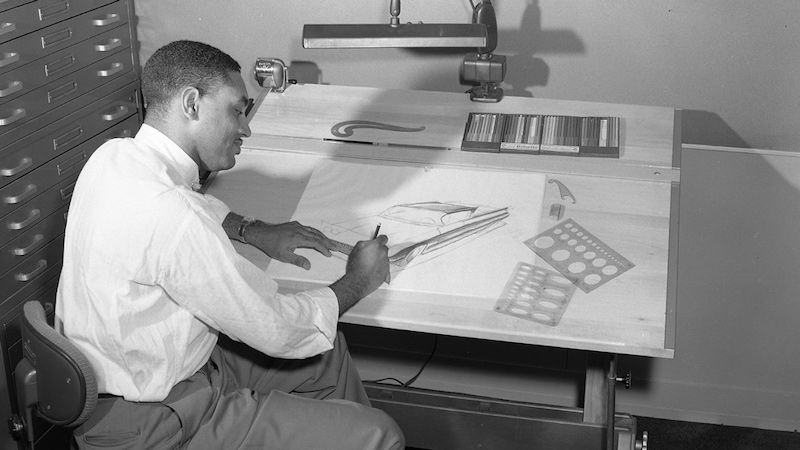 Thompson sketching a design for Ford.