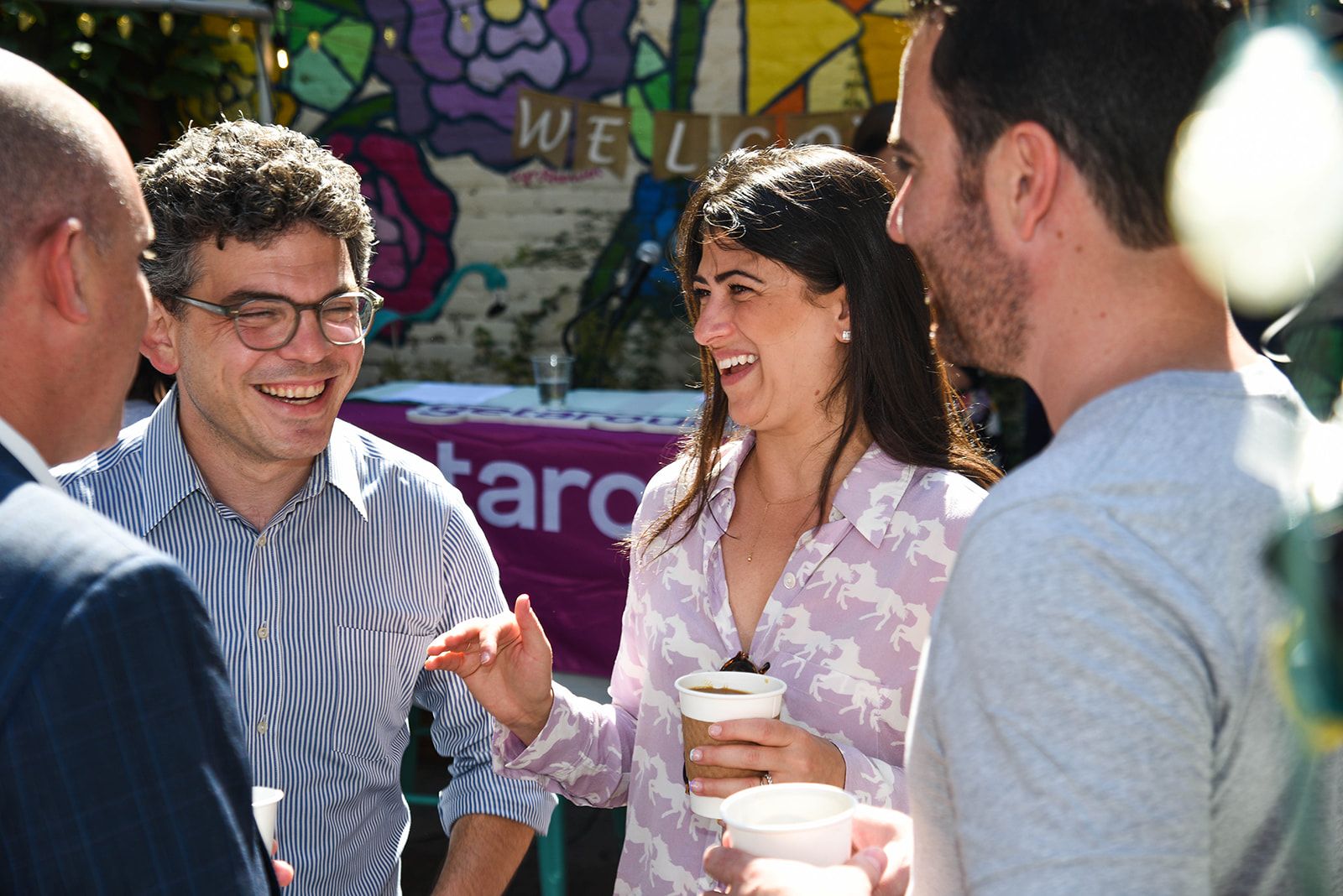 New York City Council Member Lincoln Restler talks with folks from the Getaround team. 